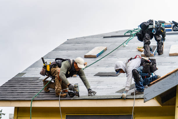 Professional Gutter Installation technician working in Burlington, MA